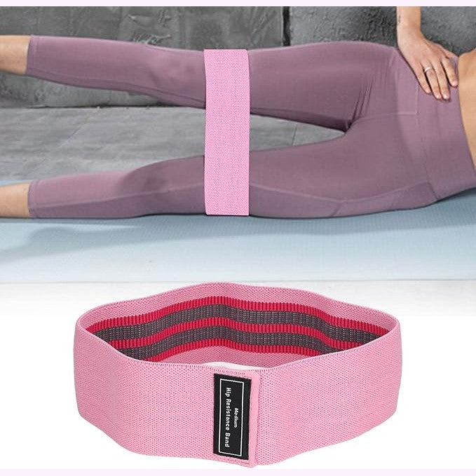 Squat resistance band, hip elastic workout band, fitness and yoga tension band, fabric resistance exercise band for hips, glutes, and legs, light resistance in purple.