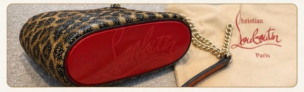 LEOPARD "Bucket Bag - PRELOVED A statement bag that combines Christian Louboutin's signature style with everyday versatility.
